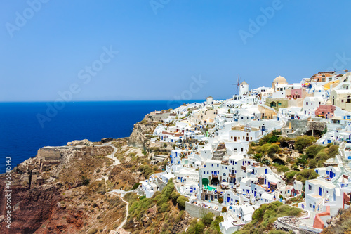 Panoramic view of Oia village with the sea in the background. Santorini island, Greece