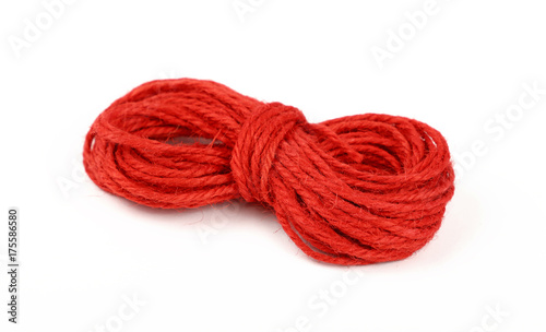 Red jute twine coil skein isolated on white