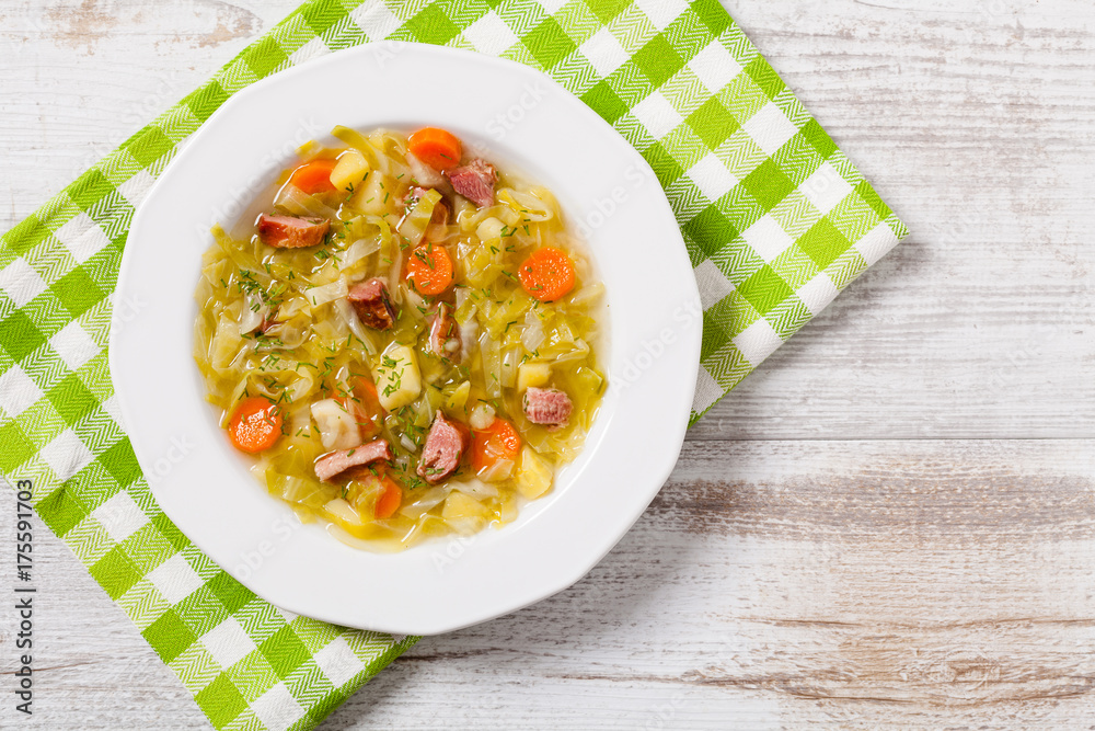 Homemade cabbage soup, cooked on smoked ribs.