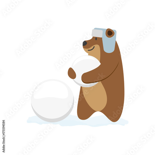 vector flat cartoon brown bear character making ice balls smiling wearing earflap hat. Winter animal outdoor games, activities concept. Isolated illustrationo on a white background