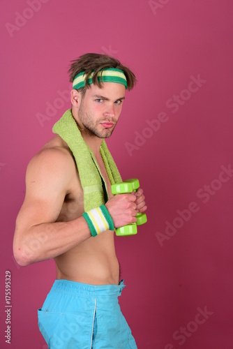 Guy with bristle wearing head and wristbands.