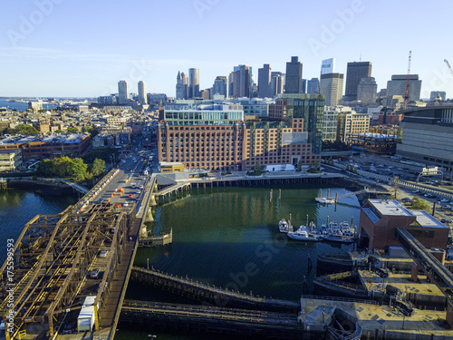 Pier of Boston Massachusetts USA, Wharf with sailboat and yachts in Charles Rive, skyline skyscrapers © Liran