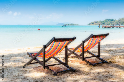 Two beach chairs on idyllic tropical sand beach. © arbalest