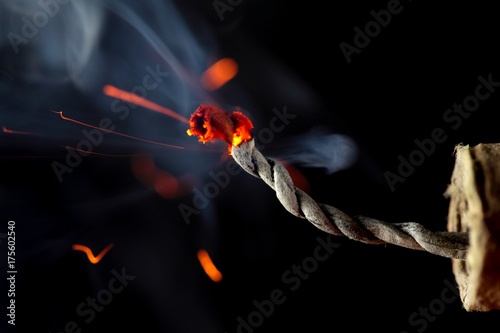 Burning fuse of a fireccracker
