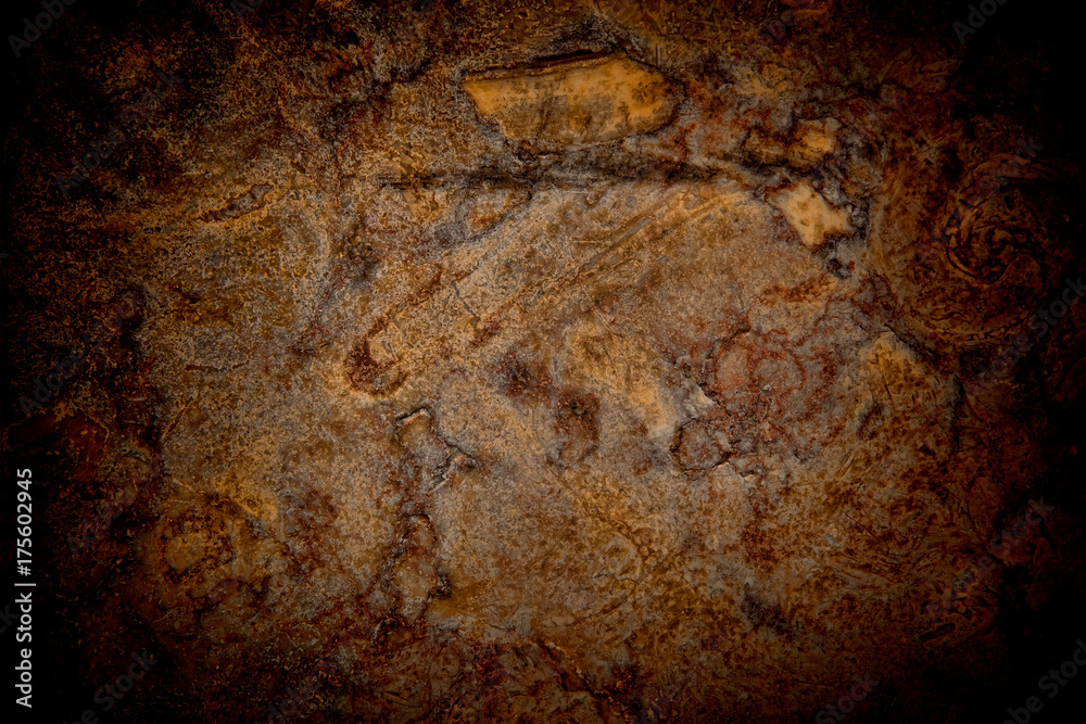Vignetted stone wall background with lots of texture Vignetted stone wall background with lots of texture