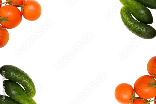 Tomatoes and cucumbers on a white background photo