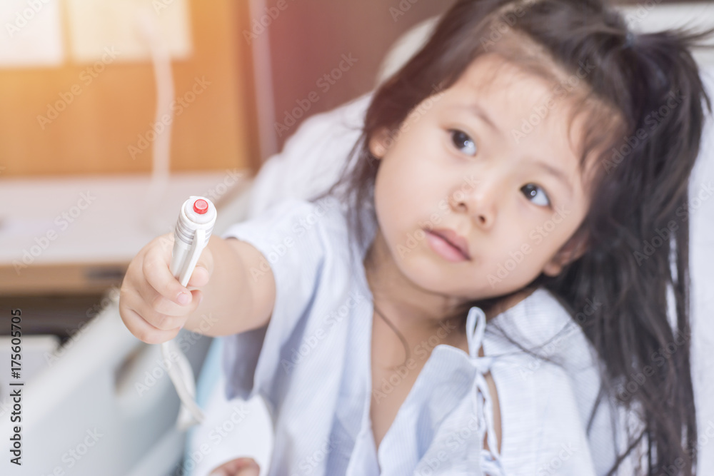 Emergency Push Button with Cute Baby Asian Girl Patient. Emergency Push Button with Cute Baby Asian Girl Patient.