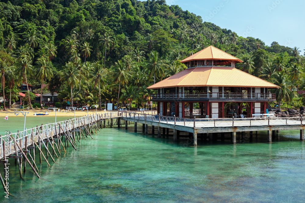 Wooden jetty on exotic beach Koh Chang island, Thailand