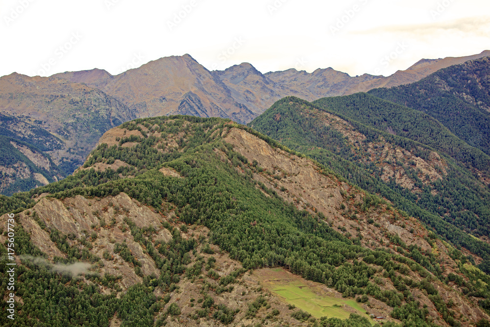 Escape to the Pyrenees from dawn to dusk Set of panoramic images of the Pyrenees from the sunrise to the sunset, where we can appreciate: meadows, mountains, rivers, villages, houses.