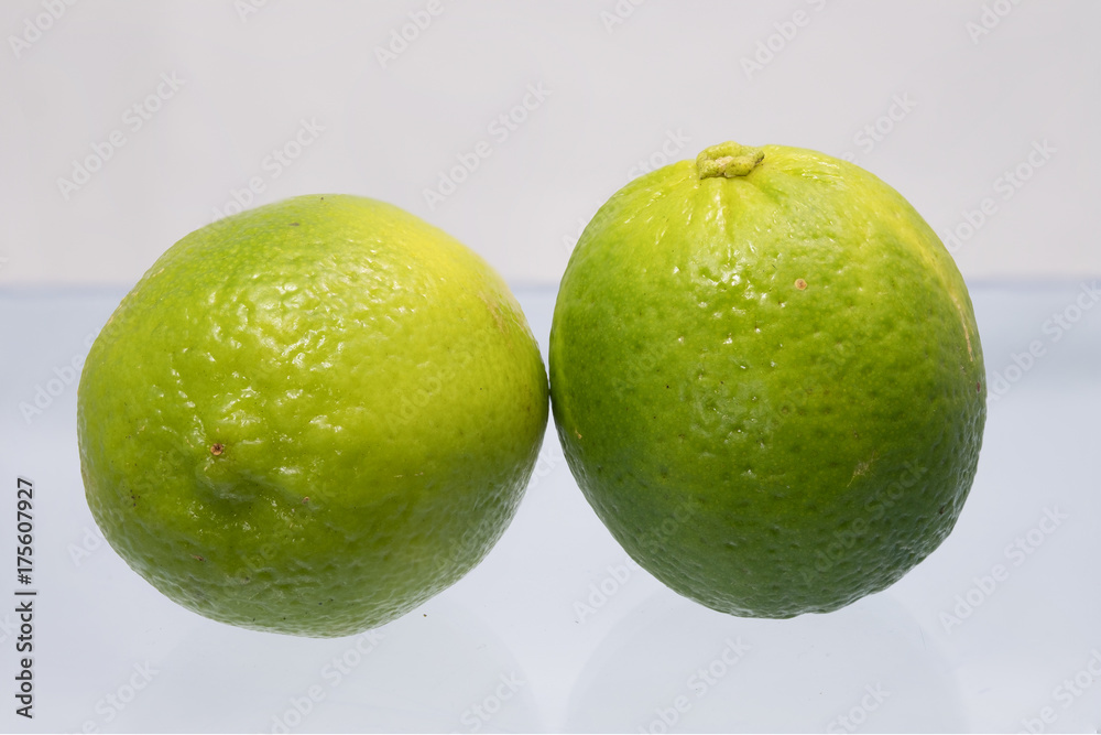 Fresh lime fruits on white background. Fresh lime fruits on white background.