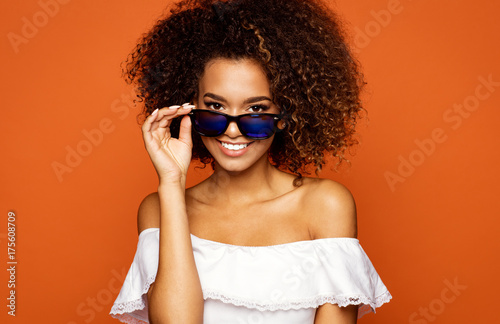 Beautiful african american female model wear sunglasses