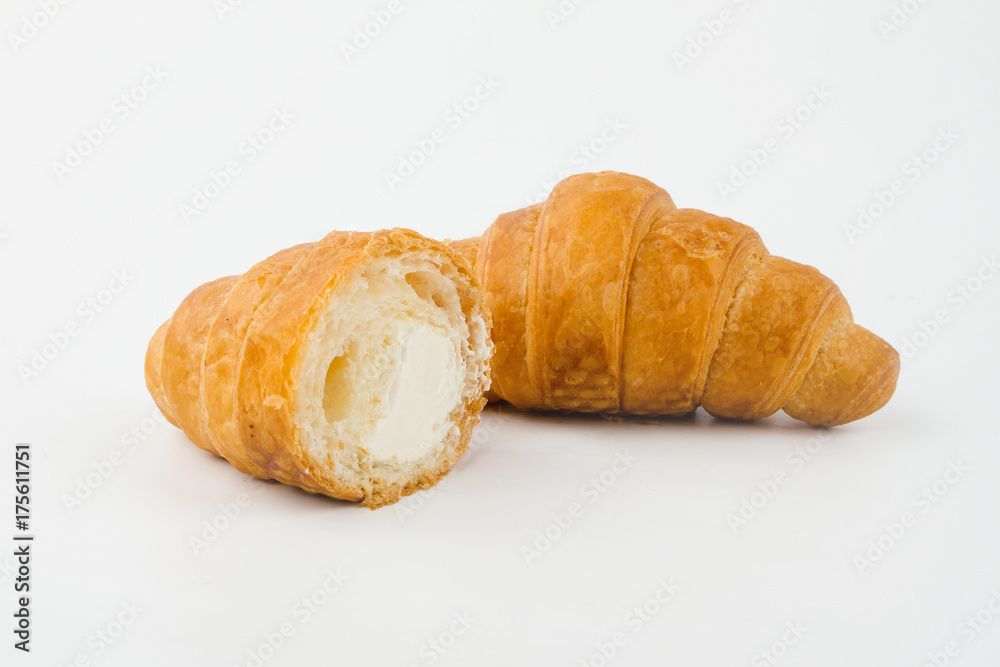 Delicious croissants with cherry jam on a white background