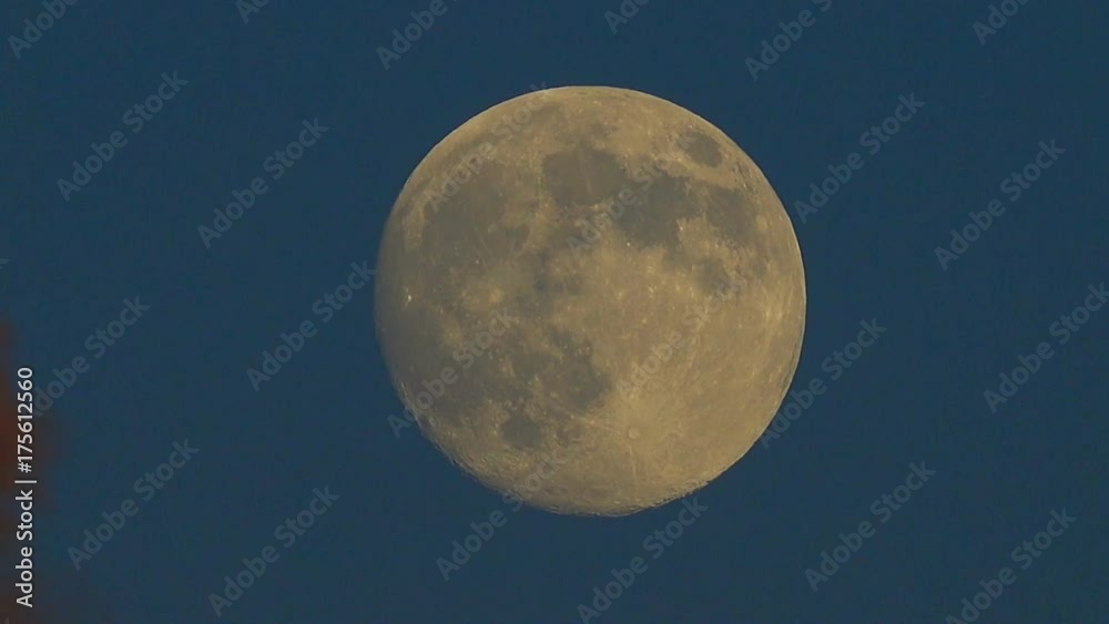 moon against the background of clouds at a sunset moon against the background of clouds at a sunset