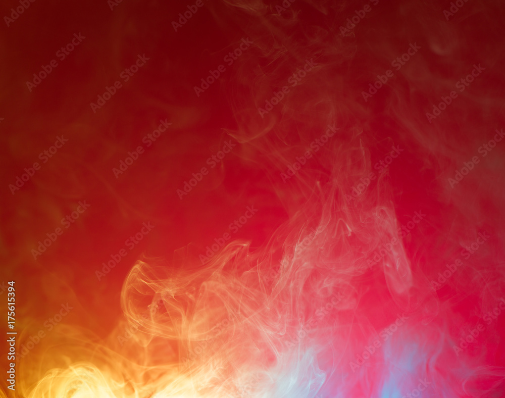 yellow and blue smoke on red background