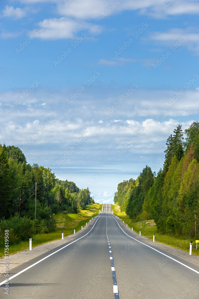 Fototapeta premium Highway with markings on the sky background.