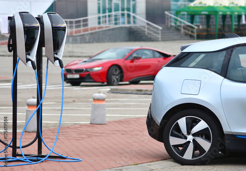  Parking for charging an electric car. Station with electric socket for electric vehicles charging. photo