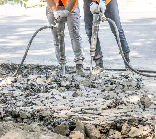 Workers with jackhammers