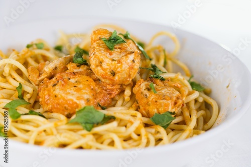 Spaghetti with chicken meat and cream sauce