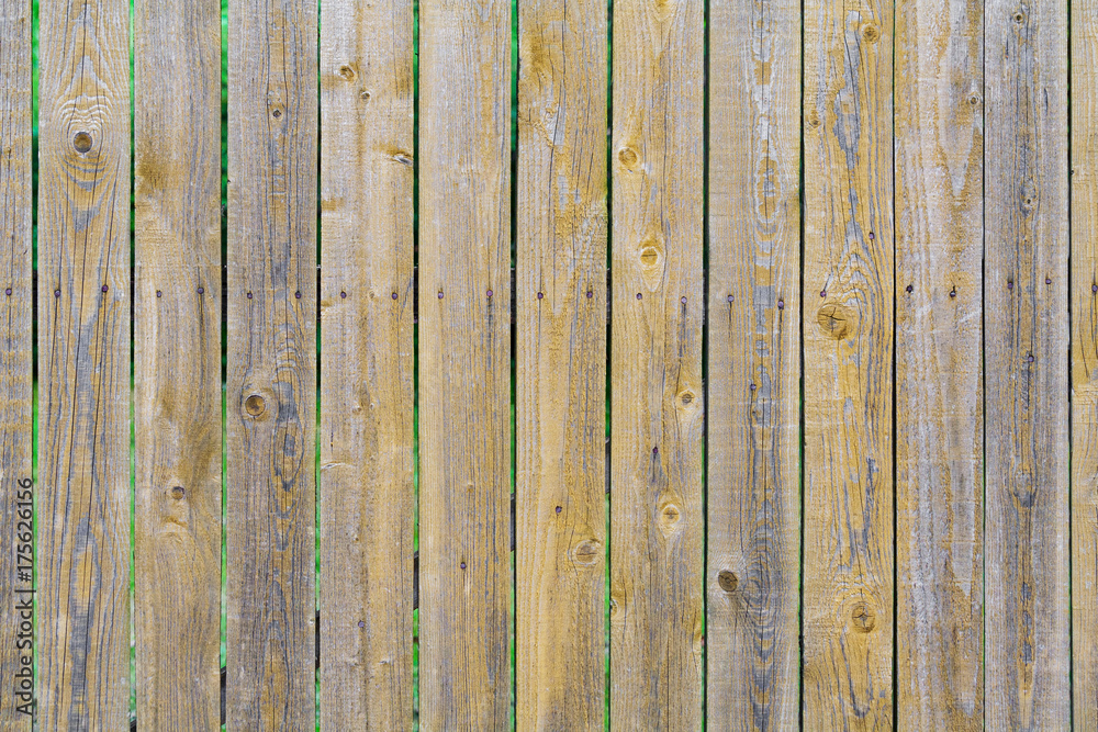 Fototapeta premium Fence of brown wooden boards planks (background, texture)