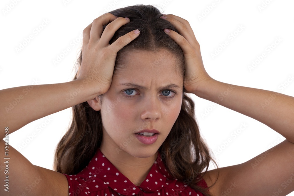 Teenage girl standing against white background Teenage girl standing against white background