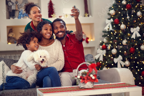 Christmas selfie - Afro American family making selfie.
