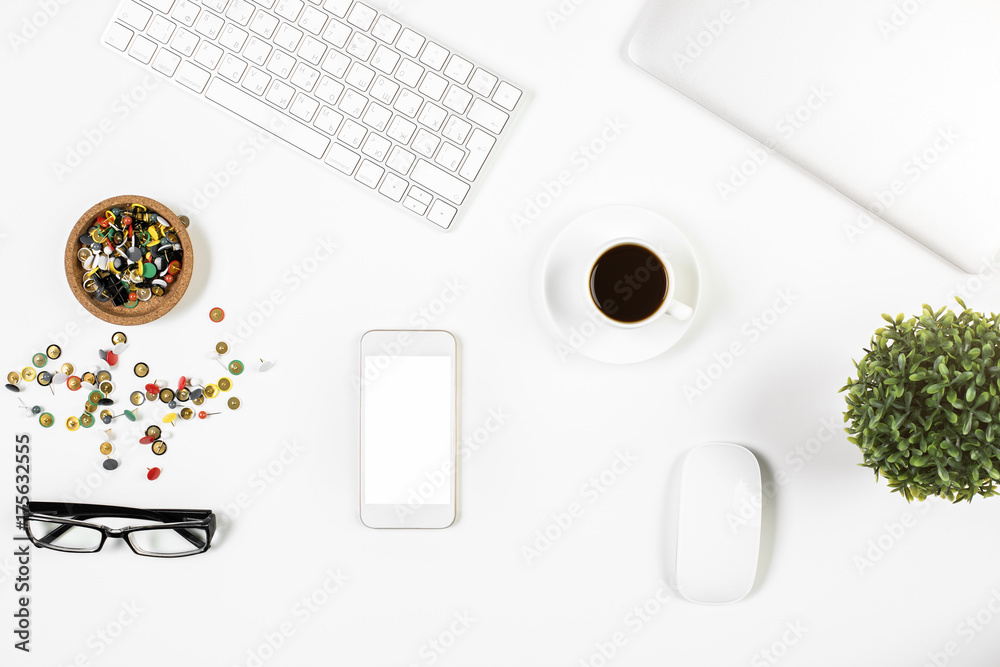 Workpace with empty mobile phone and supplies Workpace with empty mobile phone and supplies