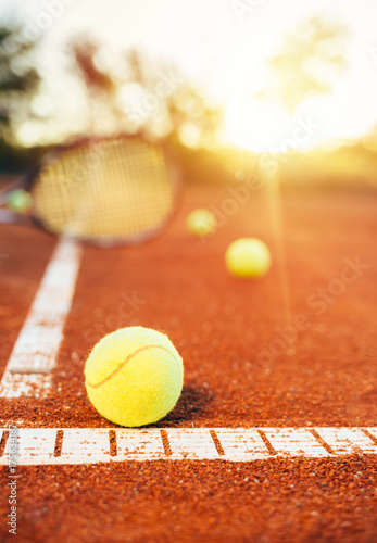 Tennis equipment on clay court © yossarian6