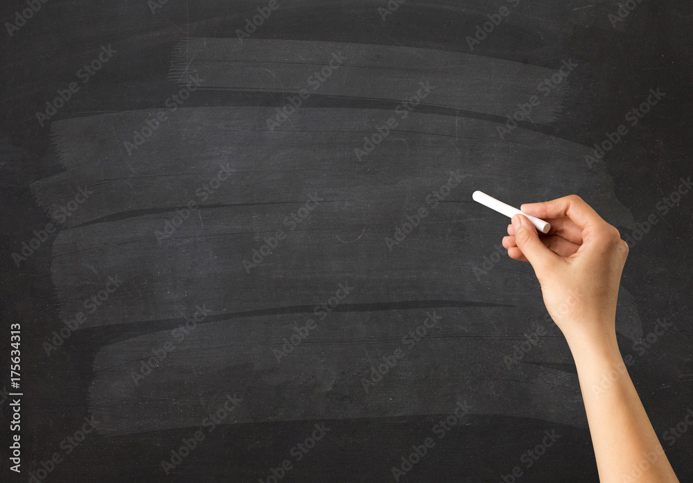 Naklejka premium Hand holding chalk