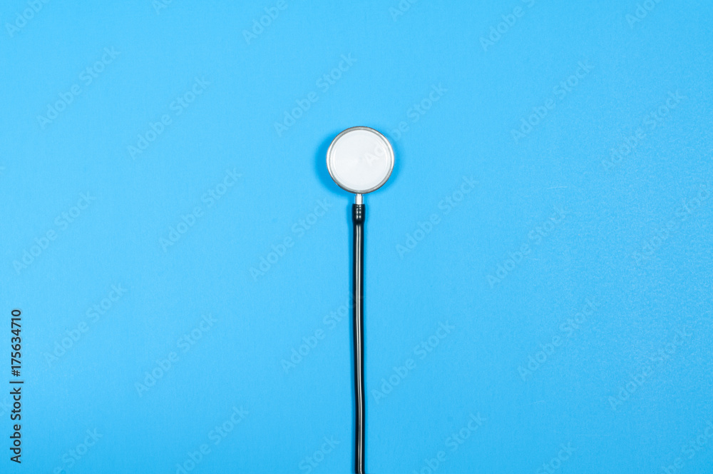 Medical stethoscope on blue background. Medical stethoscope on blue background.