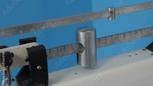 Close view of scales, weighing devices, on a blue background