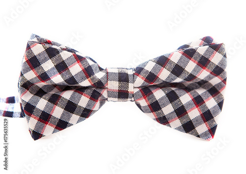 In a cage with red lines and black cubes bow tie isolated on white background, nice for party