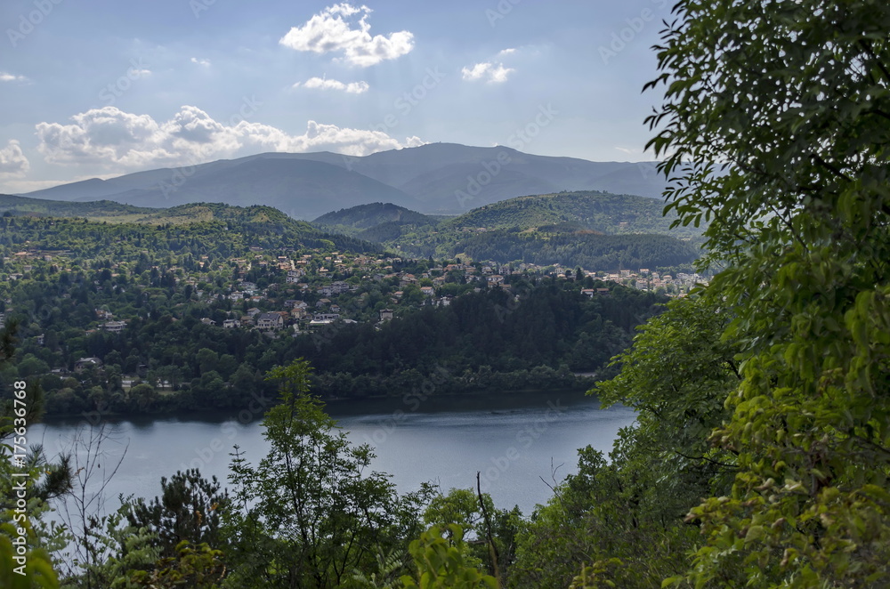 Scene with mountain, lake, glade, forest and residential district of bulgarian village Pancharevo, Sofia, Bulgaria 