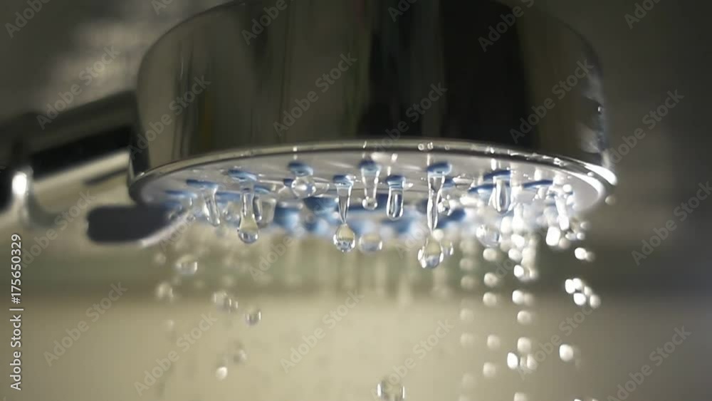 Water drops in the shower head. Slow motion Water drops in the shower head. Slow motion