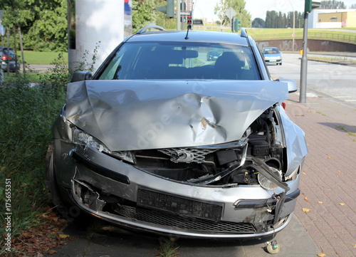 Front view close up of a crashed car