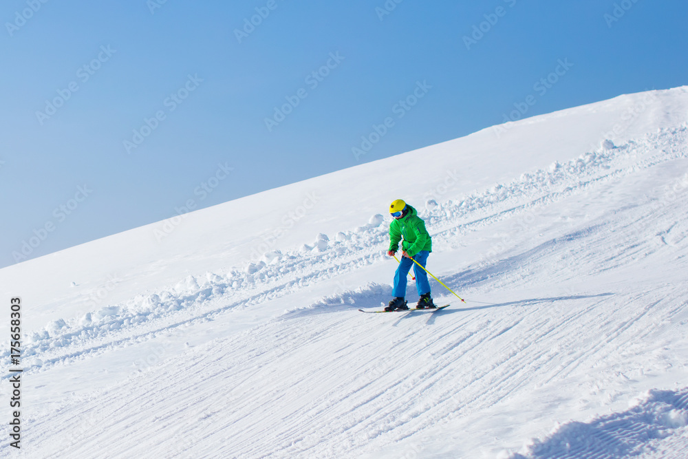 Ski and snow fun for kids in winter mountains