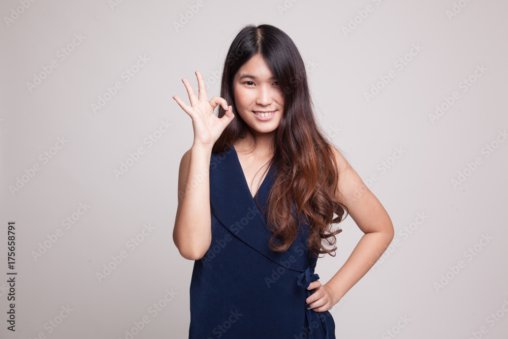 Young Asian woman show OK sign. Young Asian woman show OK sign.
