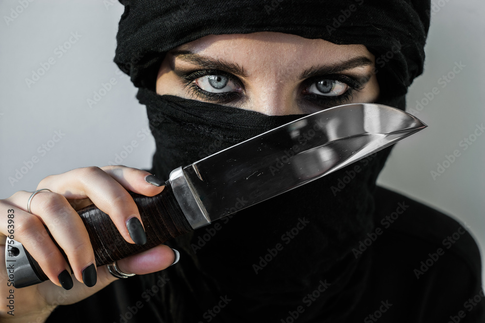 Beauty Danger Woman Posing In Evening Dress With Ritual Knife Stock Photo  Picture And Royalty Free Image Image 12151581