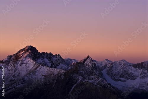 Sunrise with violet-coloured sky and snow-covered mountains, Namlos, Reutte, Tyrol, Austria, Europe © imageBROKER