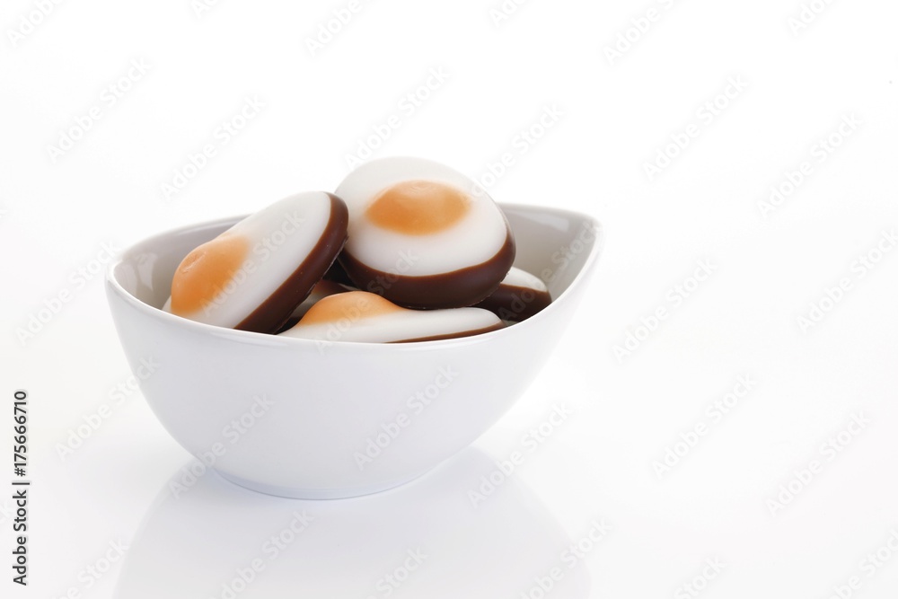 Fondant easter fried eggs in a porcelain bowl Fondant easter fried eggs in a porcelain bowl