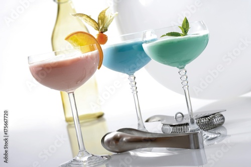 Peppermint cream liqueur, Blue Curacao cream liqueur and Campari orange cream liqueur photo