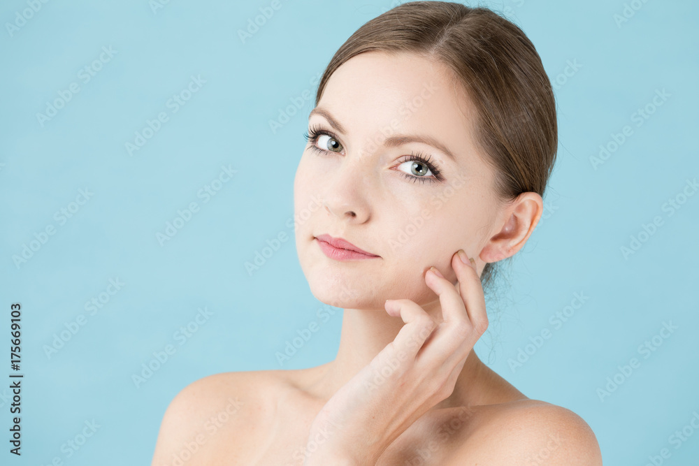 portrait of attractive woman beauty image on blue background portrait of attractive woman beauty image on blue background