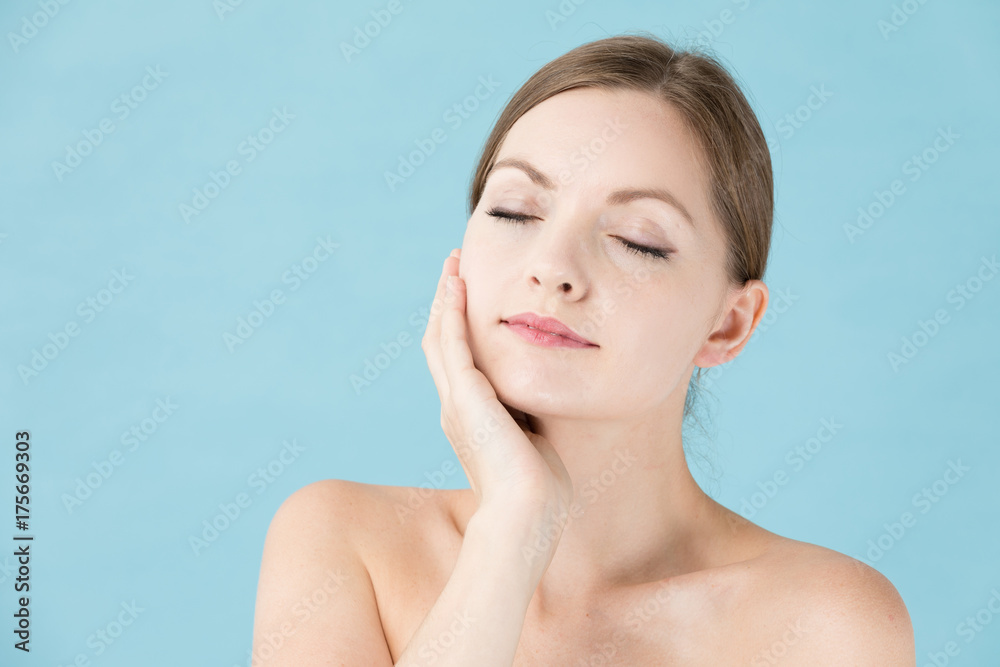 portrait of attractive woman beauty image on blue background portrait of attractive woman beauty image on blue background