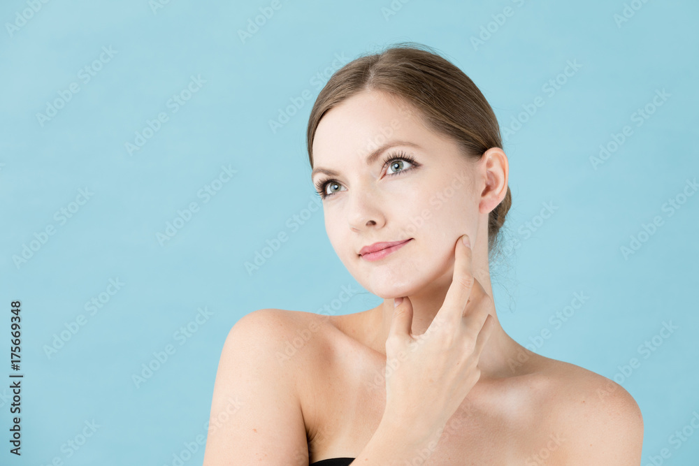 portrait of attractive woman beauty image on blue background portrait of attractive woman beauty image on blue background