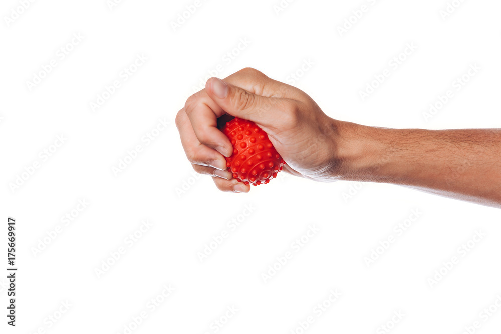 Male hand with stress ball on white background Male hand with stress ball on white background