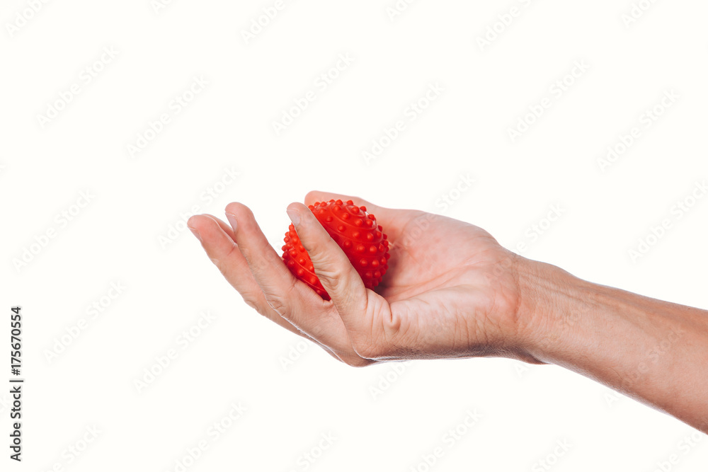 Male hand with stress ball on white background Male hand with stress ball on white background