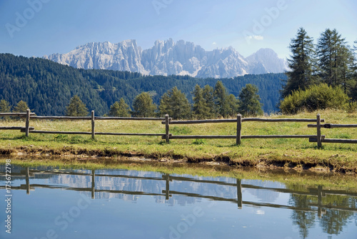 Reflection of the Latemar massif near Tiers, South Tyrol, Italy, Europe © imageBROKER