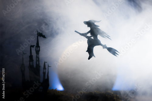 Halloween witch flying on broomstick,   Halloween background.