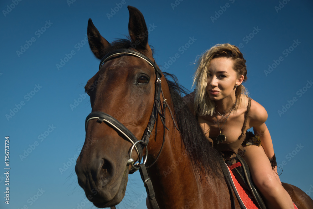 Wild amazon girl on horseback Wild amazon girl on horseback