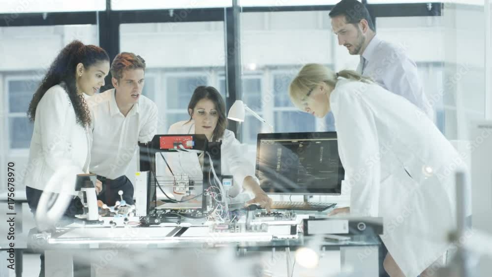  Scientific research engineers working in lab with computer & 3D printer