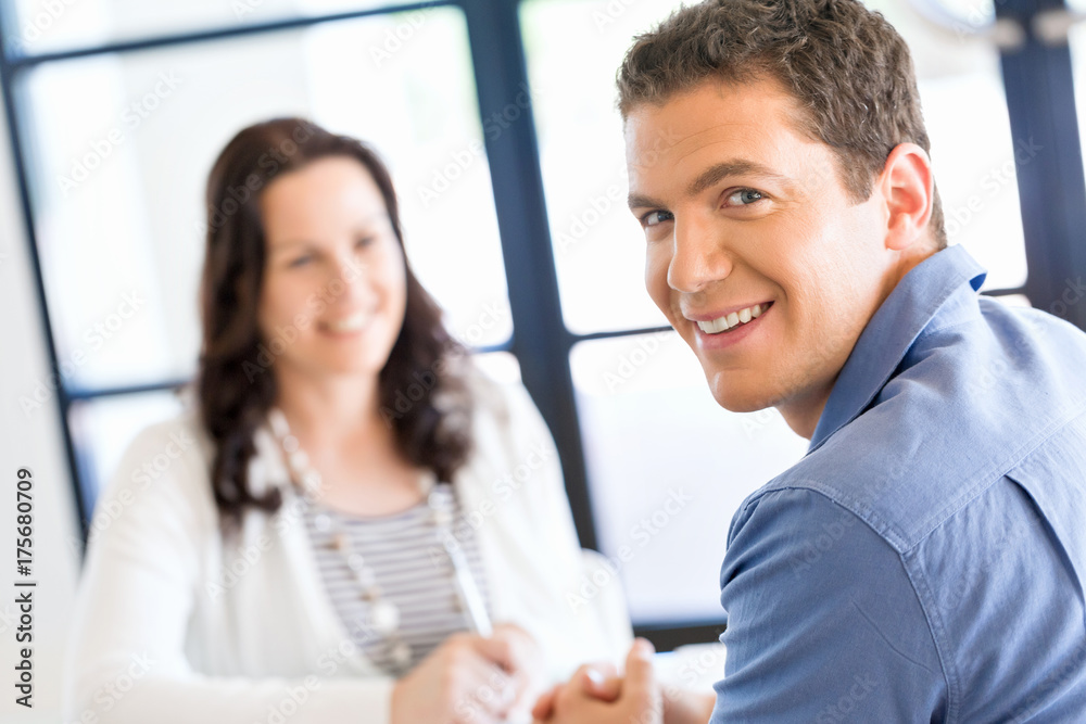 Young man in casual in office